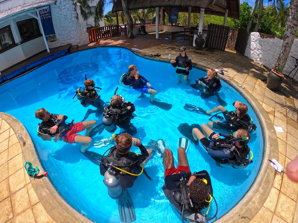 Course Director Emma Andrews briefing IDC Candidates in the pool at Crystal Divers Mauritius